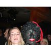 Natasja probeert haar tong te zien, en Zwarte Piet (met pet)
